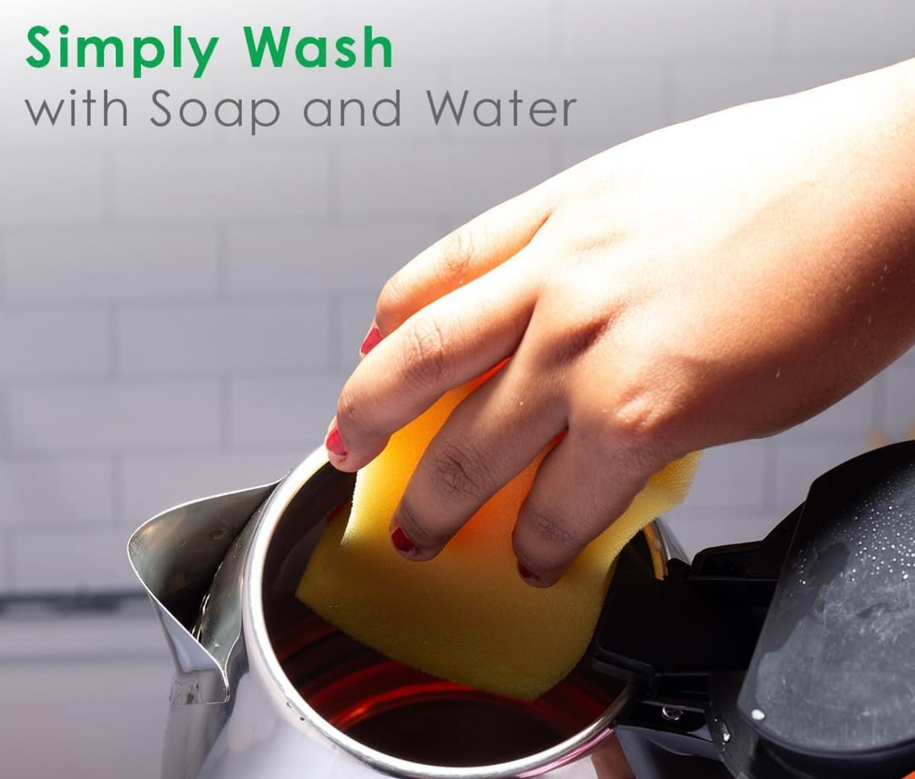 Cleaning Tanish BPA-free electric kettle with soap and water for easy maintenance